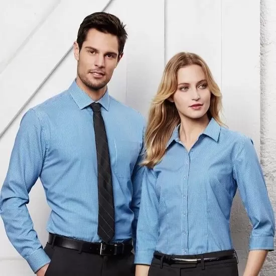 Image of men and women wearing a business shirt which can be embroidered with company logo